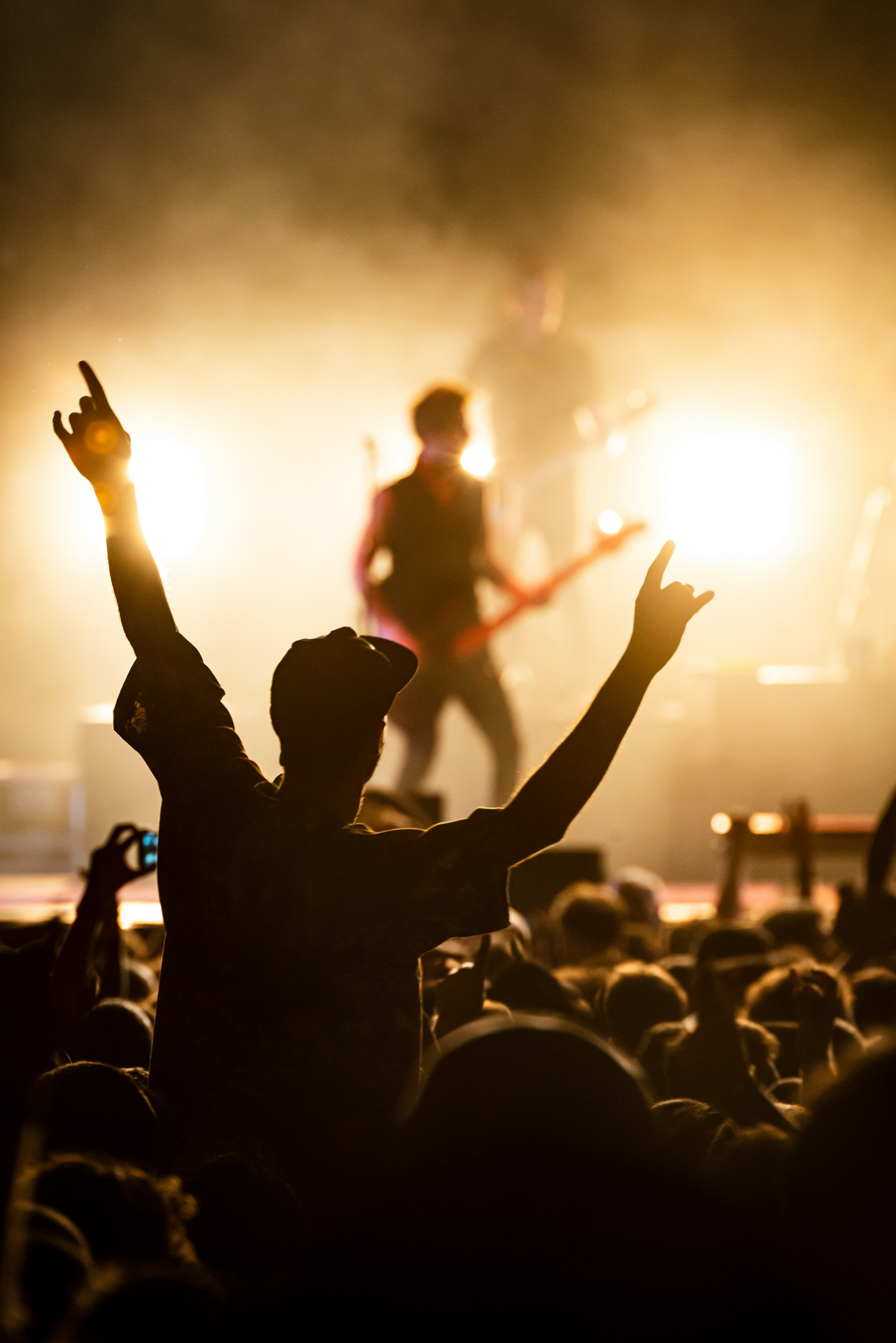 A congregation with hands raised in worship